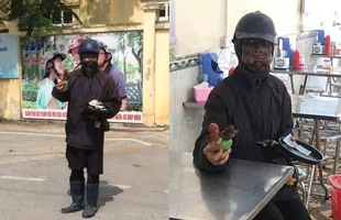 Công an truy tìm 'ninja đen' cầm đầu gà, xúc xích đi xin tiền ở Hà Nội