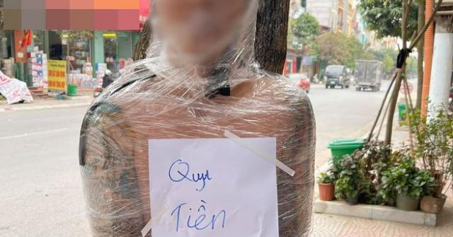 Thanh niên Hà Nội quỵt tiền xăm bị quấn băng keo kín người lên báo nước ngoài