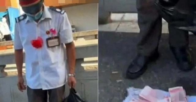 Người đàn ông bày đống tiền ra giữa đường 'cho không'