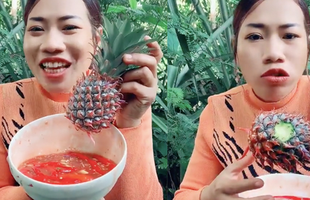 Ăn nguyên quả dứa chưa gọt vỏ, cô nàng YouTuber khiến dân mạng sợ hãi với clip Mukbang 