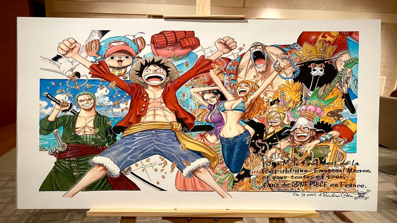 Không quản ngại đường xa, Tổng thống Pháp vẫn sang Nhật nhận tranh ... One Piece có chữ ký tác giả