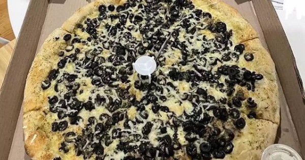 Bức ảnh chụp chiếc bánh pizza làm “tan chảy” trái tim cộng đồng mạng - GIẢI TRÍ